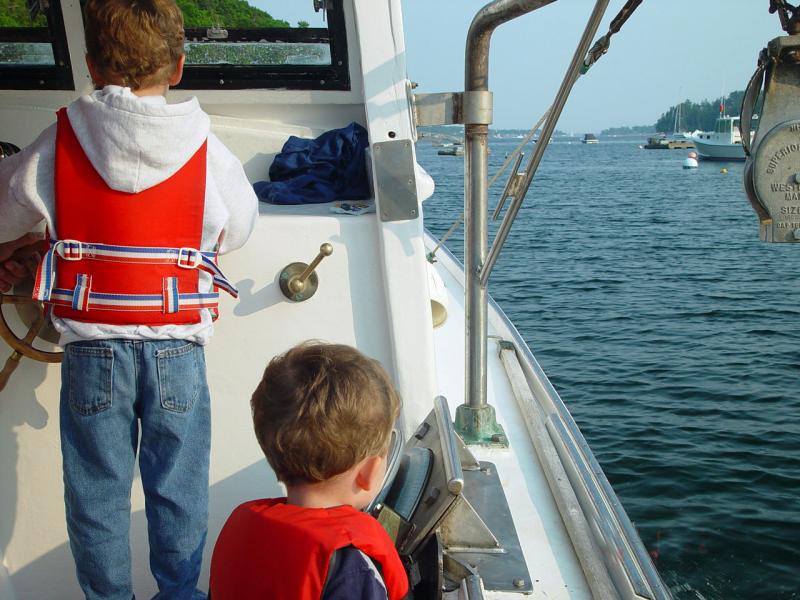Matt Burnham, at the helm, heads out to haul with younger brother, Sam, when they were younger. Lisa Burnham photo