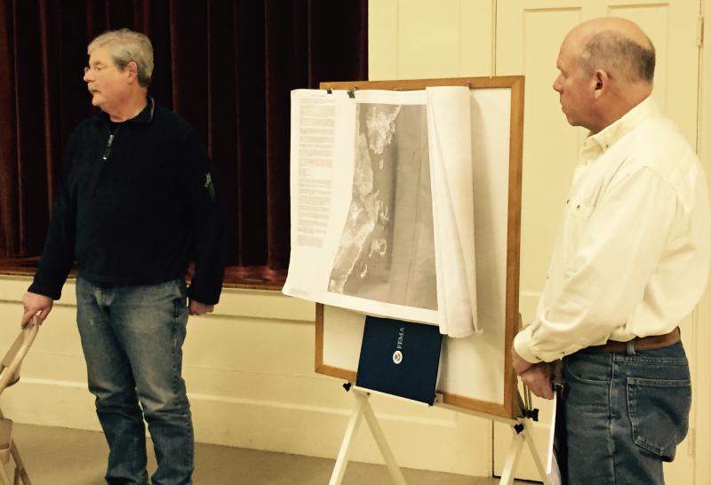 Southport Code Enforcement Officer Henry Berne, left, and Assistant CEO Jim Gagnon tell waterfront residents to call insurance agents to see if they need floodplain insurance. Gagnon told residents, at the Feb. 11 public hearing, insurance agents would conduct an in-depth study of each property to determine if it is in the flood hazard zone. LISA KRISTOFF/Boothbay Register Henry Berne and Jim Gagnon of Southport ME