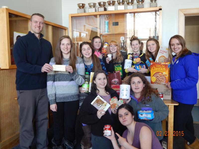 The Boothbay Region High School Interact Club donated a check for $500, and a lot of food items, to go towards BRHS’s WGME School Spirit Challenge. The challenge goes until Feb. 27, when it will culminate in an all-school rally starting at 6 a.m. Students will be wearing blue and gold to show their school pride. Courtesy of Debbie Graves