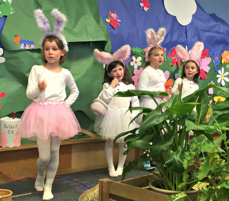 The rabbit family. From left: Mother Rabbit (Beatrix Recoing-Tallen), Flopsy (Ava McDuff), Mopsy (Ally Warren), and Cottontail (Azara Bishop). KATRINA CLARK/Boothbay Register