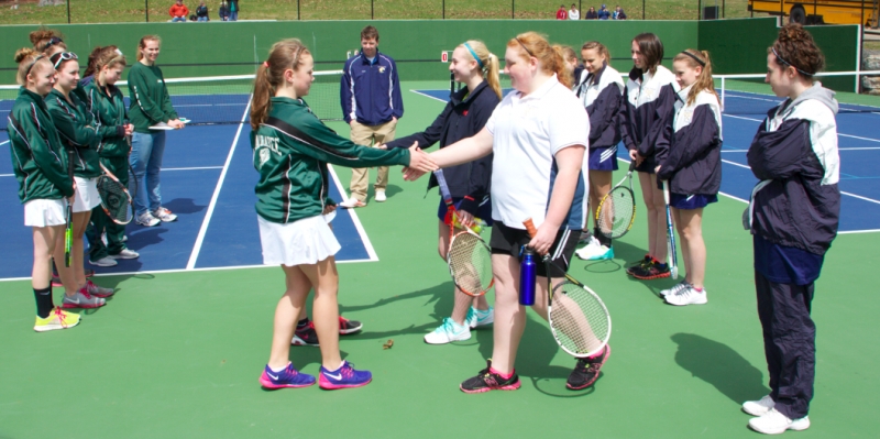 Carrabec Cobras line up with Boothbay Lady Seahawks to greet each other before the match. RYAN LEIGHTON/Boothbay Register