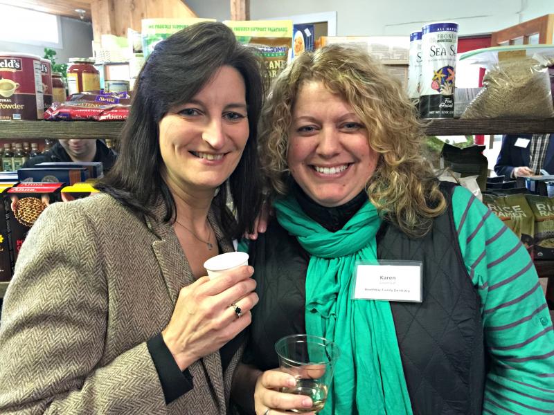 Leisha J. MacDougall, photo lab manager at Harbor-Tech Solutions, left, and Karen Greenleaf of Boothbay Family Dentistry at the Business After Hours. KATRINA CLARK/Boothbay Register