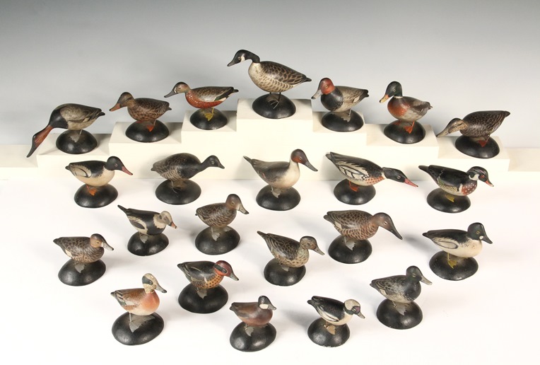 Set of 23 carved wood miniature duck decoys by A. E. Crowell. Courtesy photo