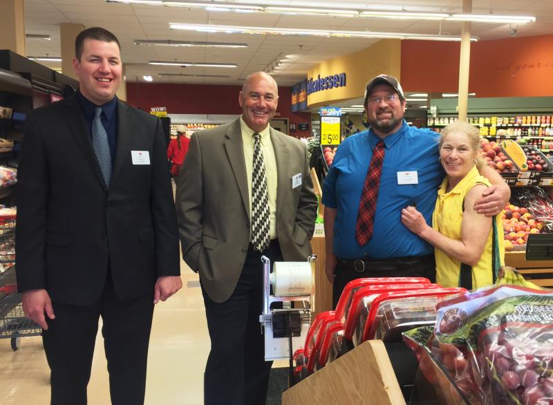 Hannaford representatives Ben Convery, left, Bob Hatem, Chuck Cunningham Denise Wagner were inside the door to greet customers on June 14. SUZI THAYER/Boothbay Register