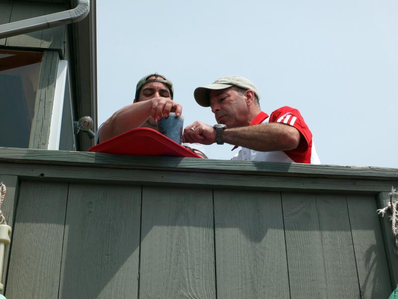 Photographer Ted Axelrod, left, and Mitch Weiss discuss the finer points of food photography. SUZI THAYER/Boothbay Register