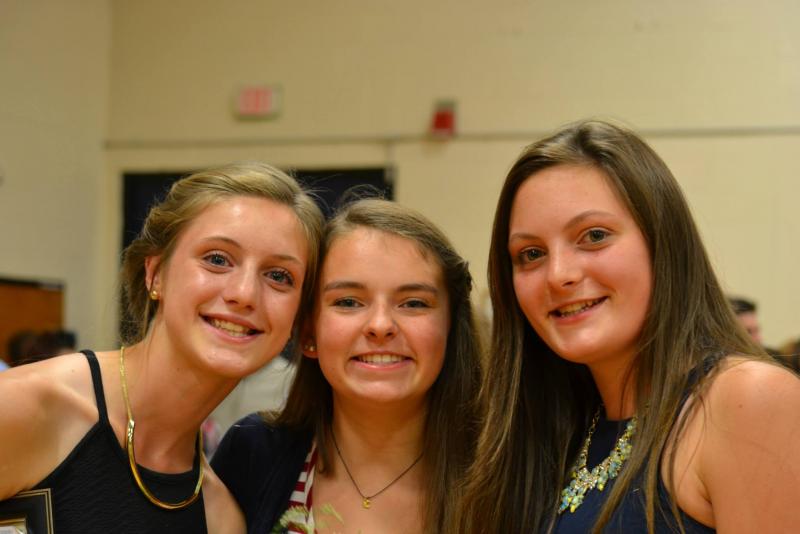 Graduate Helen Hamblett, left, with her friend Maggie Larson, center, and sister Lincoln Hamblett. Courtesy of Meagan Hamblett