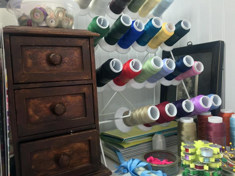 Spools of colorful threads used in Deb Boucher’s quilts. SUZI THAYER/Boothbay Register