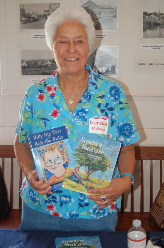 Children’s book publisher Francine McEwen of Manchester with two of her recent titles. ART MAYERS/Boothbay Register