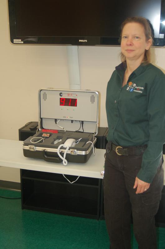 Tara Jones simulates a 911 emergency call. ART MAYERS/Boothbay Register