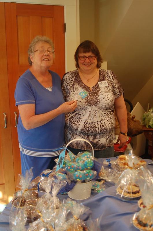 Joni Leigh and Cathy Tyler preside over the sweets at the bake sale. ART MAYERS/Boothbay Register