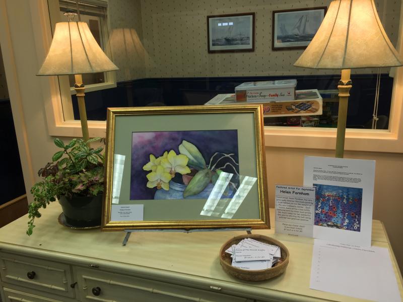 Local painter Helen Farnham donated one of her watercolors to be the first painting to be auctioned off at the center, which will feature an artist of the month. SUZI THAYER/Boothbay Register