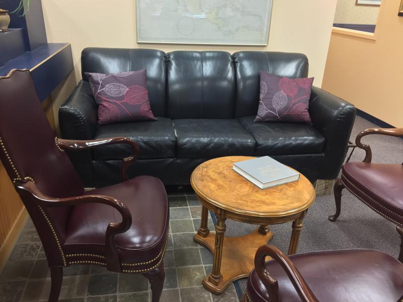 This large, comfortable leather couch and chairs are from the Rotary Club auction. SUZI THAYER/Boothbay Register