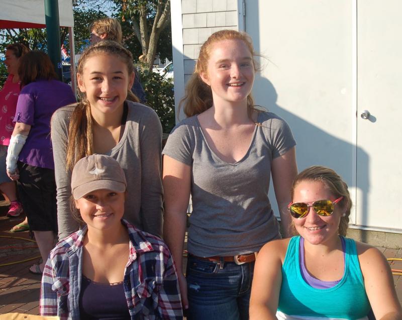 Eighth graders (front left to right) Hali Goodwin, Maddy Faulkingham (back) Chloe Arsenault, Josey Smith sell tickets. ART MAYERS/Boothbay Register