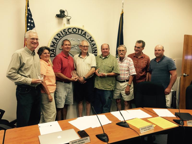 The Community Energy Fund’s three founders were awarded the Spirit of America Award from the town of Damariscotta during the Sept. 2 meeting. Pictured, from left: Charlie Ault, Selectmen’s Chairman Robin Mayer, Robert Clifford, Selectman Ronn Orenstein, Todd Maurer, Selectman George Parker, Selectman James Cosgrove and Selectman Joshua Pinkham. BEN BULKELEY/Wiscasset Newspaper
