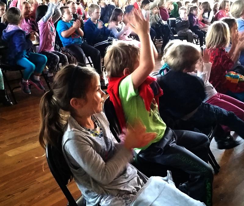 Natalie Flagg from BRES claps after the concert. KATRINA CLARK/Boothbay Register