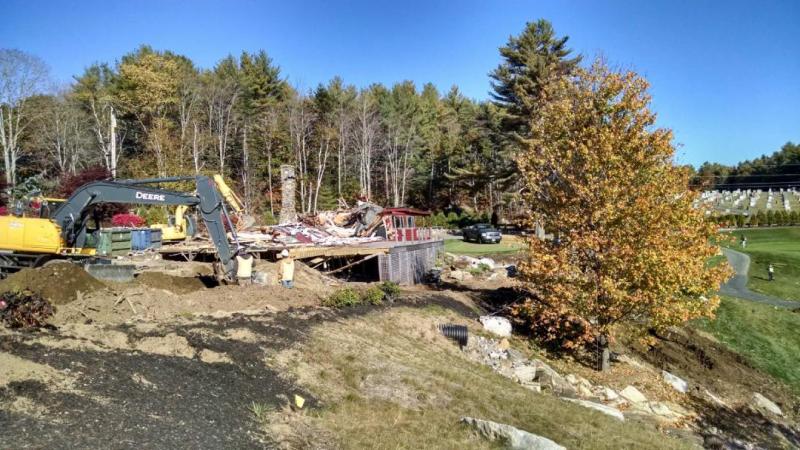 Demolition of the former country club clubhouse, as seen from the new clubhouse. Courtesy of Steve Butler
