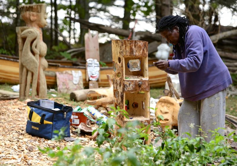 Irene Wanjiru creates while surrounded by some of her work.- Robert Mitchell Photography Irene Wanjiru