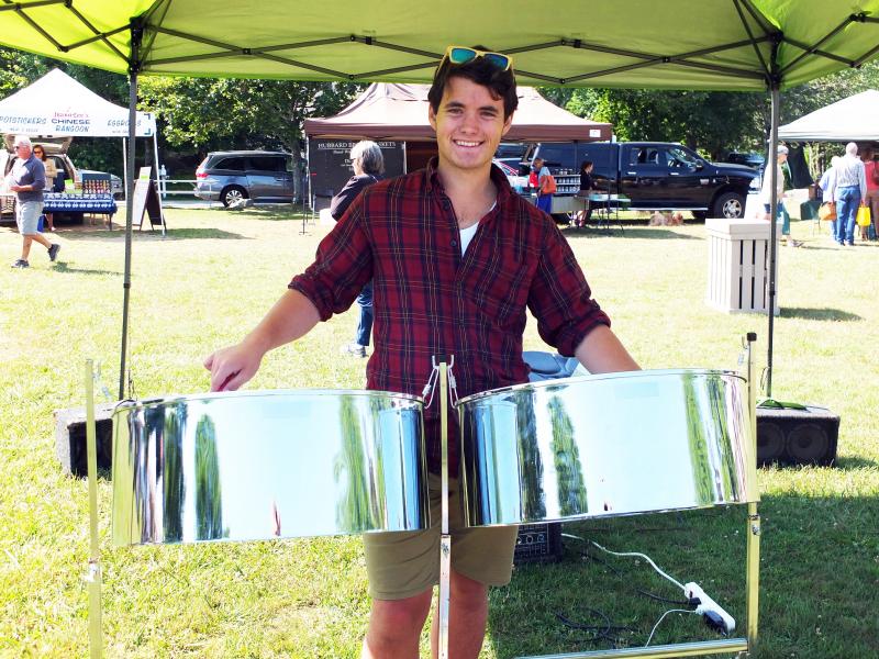 Ben Betts played his steel drums at the farmers’ market on the Boothbay Common last summer. SUZI THAYER/Boothbay Register