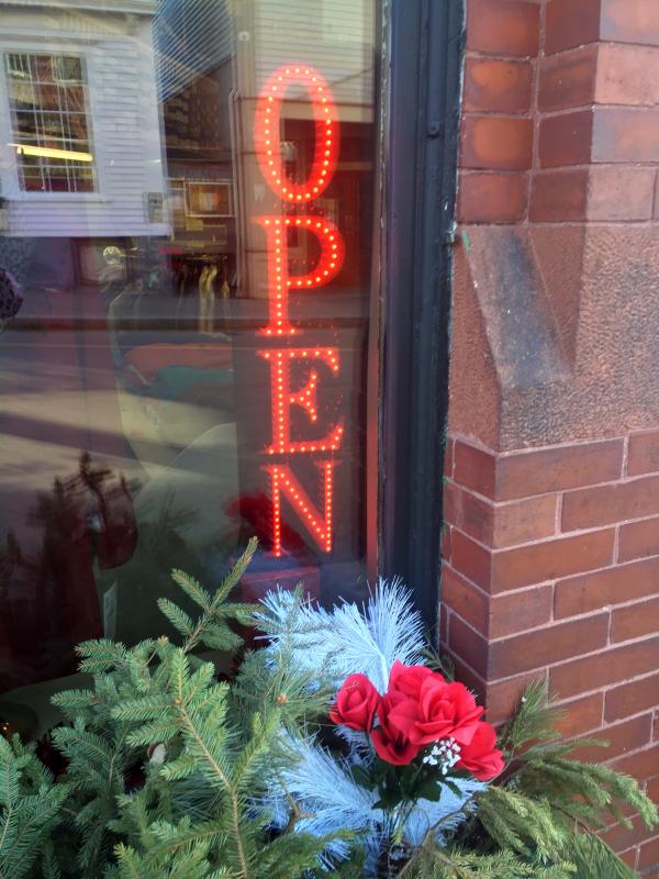 A sign in Janson’s Clothing window. SUZI THAYER/Boothbay Register