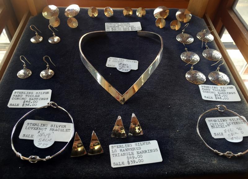 A case showing some of Peter Dombrowski’s silver jewelry. SUZI THAYER/Boothbay Register