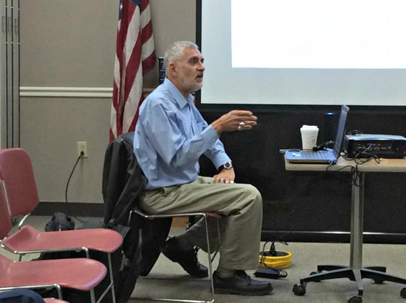 Bob Faunce talks about the “100-year storm”, which refers to a 1-percent chance of a major storm with serious flooding occurring during a year. KATRINA CLARK/Boothbay Register