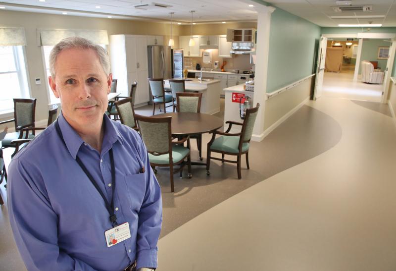 St. Andrews Executive Director Loriman Looke stands near nurse’s station at the Zimmerli Pavilion. Courtesy of Scott Shott