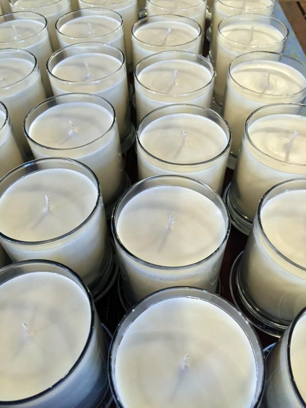 On March 29 there was a large table covered with newly poured Seawicks candles waiting to be cleaned up and labeled to ship to L.L. Bean. SUZI THAYER/Boothbay Register