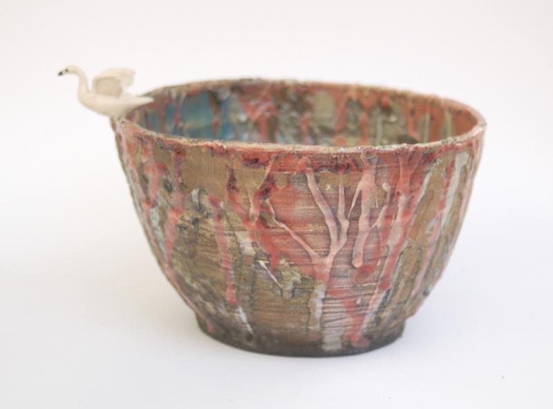 Lincoln Academy art student’s drinking cup with bird on rim.