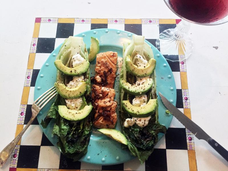 Another fancy dinner in Edgecomb: Grilled romaine with a creamy lemon dressing and avocodo slices, served with roasted salmon. SUZI THAYER/Boothbay Register