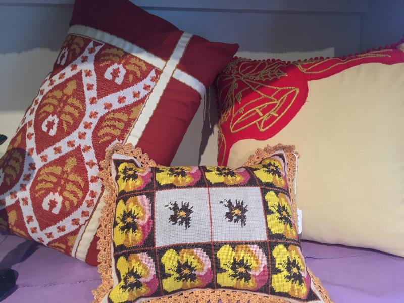 Hand-stitched pillows are available in the new flower shop in Wiscasset, Water Lily Flowers and Gifts. SUZI THAYER/Boothbay Register