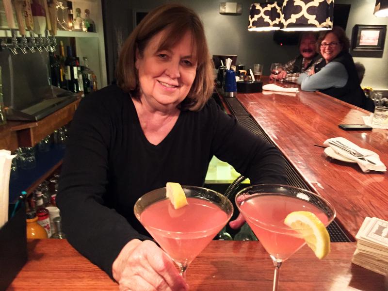 Bartender Marilyn Gorneau keeps customers smiling, at the bar and throughout the dining room at Little Village Bistro. SUZI THAYER/Boothbay Register