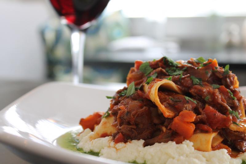 Slow-braised bolognese papardelle with fresh ricotta. Courtesy of Tony Bickford