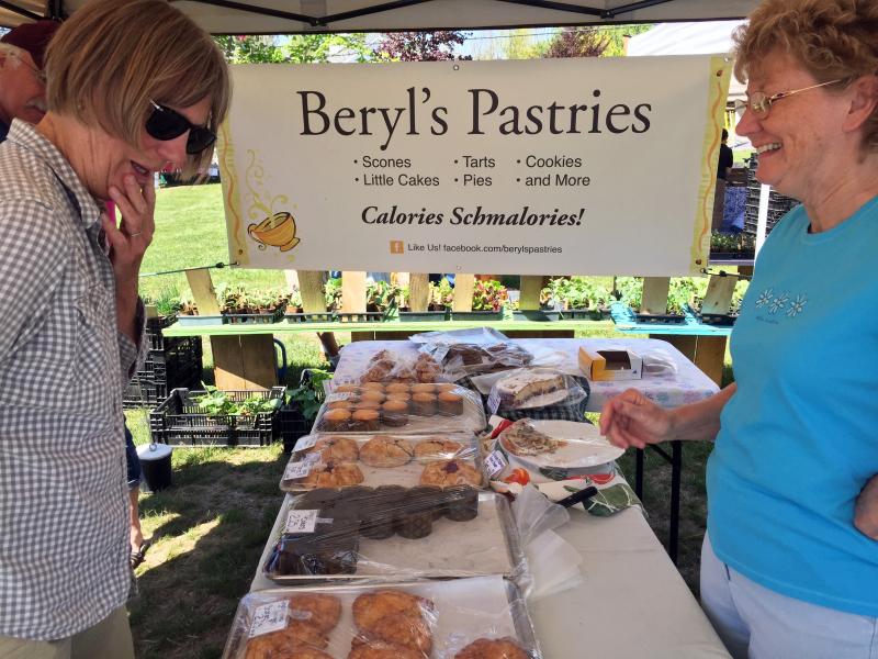 Susie McGinnis makes her way to Beryl’s Pastries stand every Thursday — from an island! SUZI THAYER/Boothbay Register