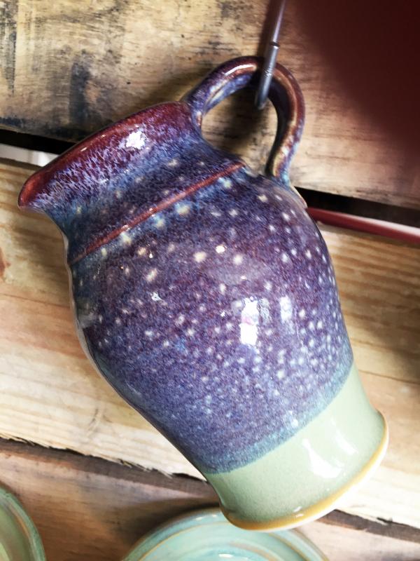 Julie Moore experiments with five basic glazes to come up with new colors. SUZI THAYER/Boothbay Register