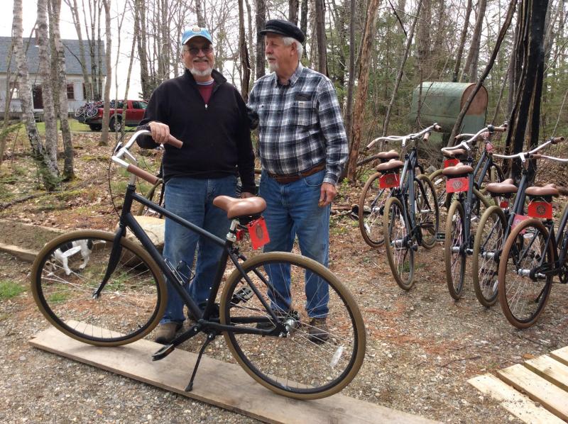 Mike Thompson, grant-winner (left) and Seth Hedgcock, bike program founder, show off one of last year’s Priority bikes that survived last summer’s loaner season in good repair at the Rotary work party on May 7 to ready bikes for the summer season. Courtesy of Patty Seybold