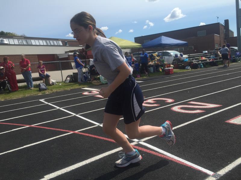 Boothbay Region Elementary School sixth grader Gracie Giles starts a race on the Wiscasset Middle High School track, setting for a regional Special Olympics track and field event May 20. SUSAN JOHNS/Wiscasset Newspaper