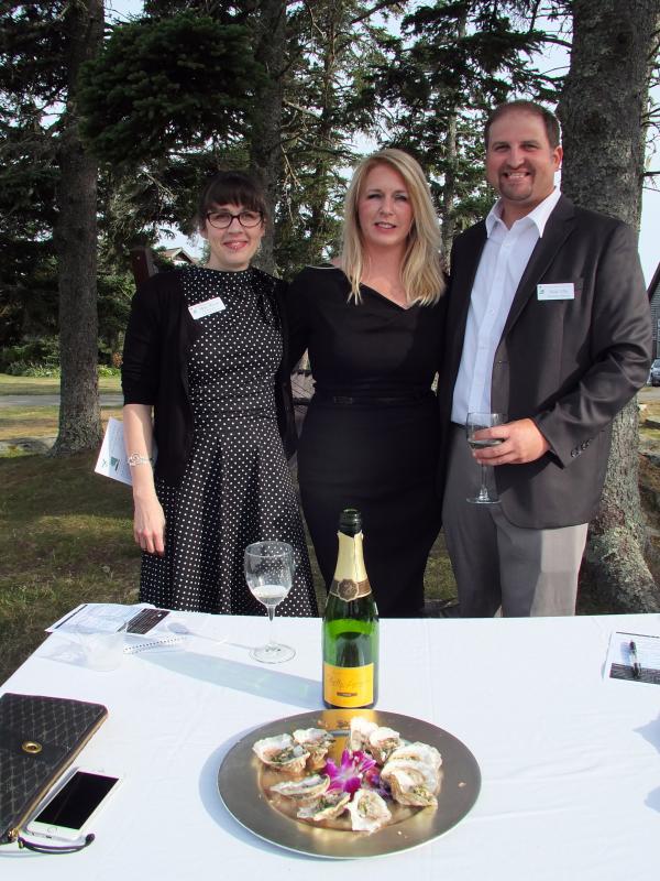 Skye Wood, Erica Archer and Nick Ullo all helped pull off and evening of wine tasting and food pairing, along with a cruise on the Balmy Days, without a hitch. of SUZI THAYER/Boothbay Register