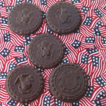 The chocolate medallions made by Boothbay Harbor shop And Candy Too! that benefit the Travis Mills Foundation to help wounded veterans. Courtesy of Sarah Fahnley.