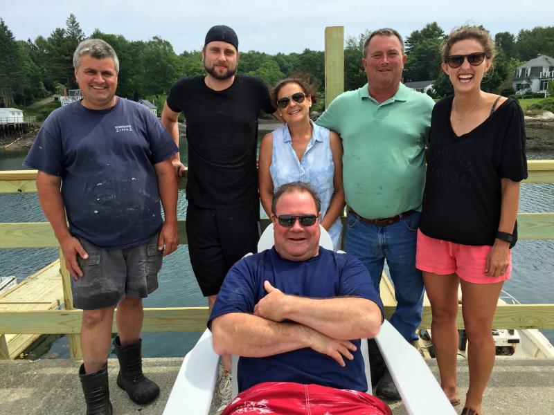 David Winslow, front, recently turned over the reins at Robinson’s Wharf. Back row, left to right: Richard Simmons, who does a little of everything, Chef Aric Pickens, managers Rachael Leeman and Hugh Thompson, and new owner Kellie Slater. SUZI THAYER/Boothbay Register