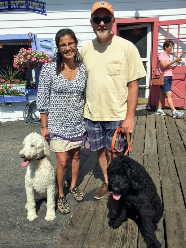 Hayat and Matt Guggenheim, from right here in Boothbay Harbor, brought Elka, left, and Winston into town for a walk and some friendly pats on the head. SUZI THAYER/Boothbay Register