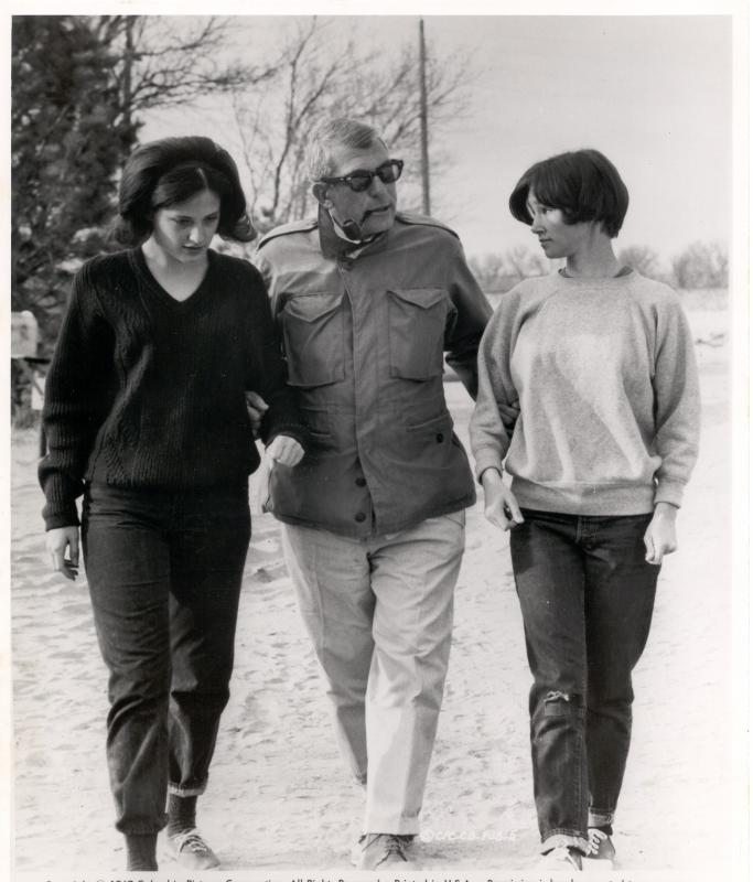 Actresses Mary-Linda Rapelye, right, and Brenda Currin walk along with “In Cold Blood” director Richard Brooks during a break in the filming. Courtesy photo