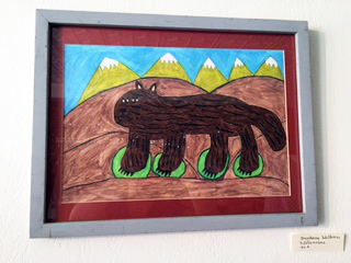 Painting of a wolverine walking on moss patches by Barbara Welborn. Courtesy of Kimberly Welborn