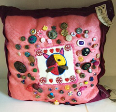 An embroidered pillow by Barbara Welborn. Courtesy of Kimberly Welborn