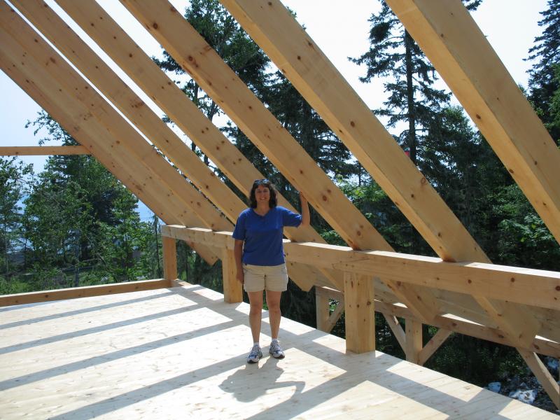 Elaine in the rafters of what would become the Education Center on Burnt Island. Courtesy of Elaine Jones
