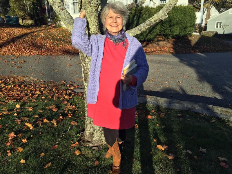 “Red Ruby Heart in a Cold Blue Sea” author Morgan Callan Rogers, in front of the Boothbay Register, where she works as a reporter. SUZI THAYER/Boothbay Register