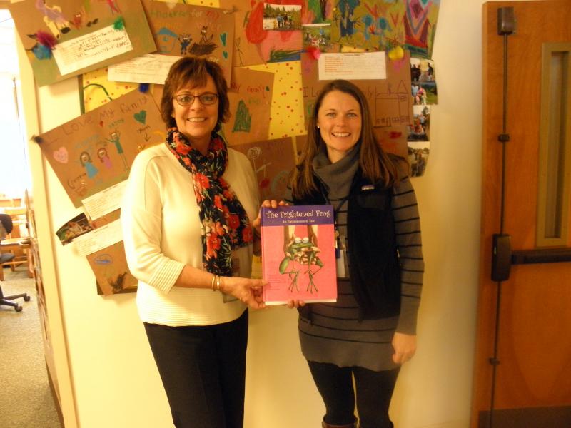 Principal Lisa Clark, left, and Cindy Casey, 1st and 2nd grade teacher, both of Edgecomb Eddy School with “The Frightened Frog.” Courtesy photo