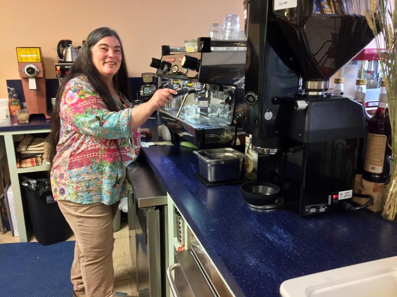 BUZZ MAINE owner Jennifer Van Horne pours an espresso from her state-of-the-art espresso machine. SUZI THAYER/Boothbay Register
