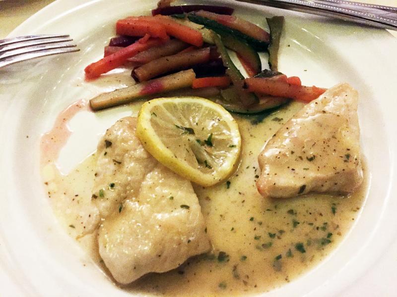 The main course of pollo al limone – boneless breast of chicken sauteed with lemon, wine and fresh herbs – was included in the Four-Course Tasting Menu at Ports of Italy on Dec. 2. SUZI THAYER/Boothbay Register
