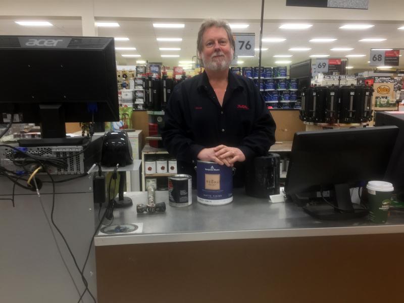 Steve Averill mans the paint department. SUZI THAYER/Boothbay Register