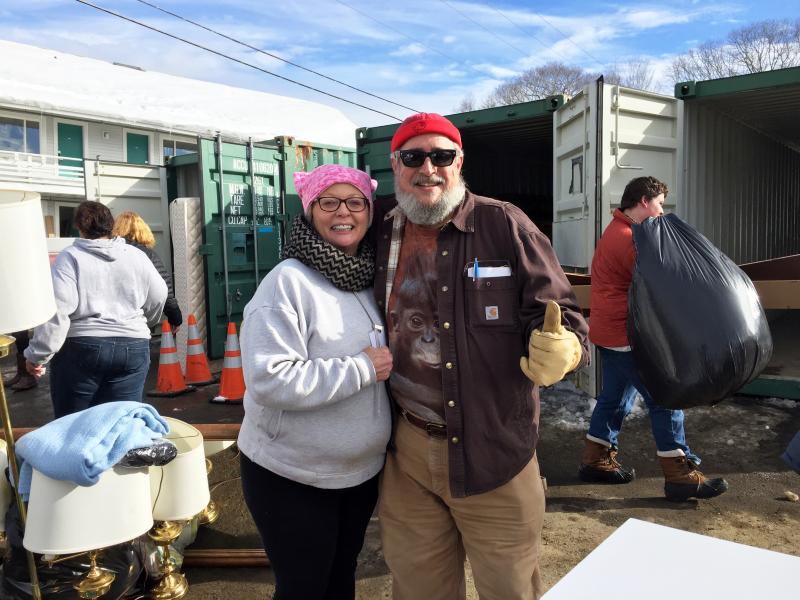 Holly Stover and “Big Al” Cohen pitch in to help the community at the redistribution event on Feb. 18. Courtesy of Michelle Amero